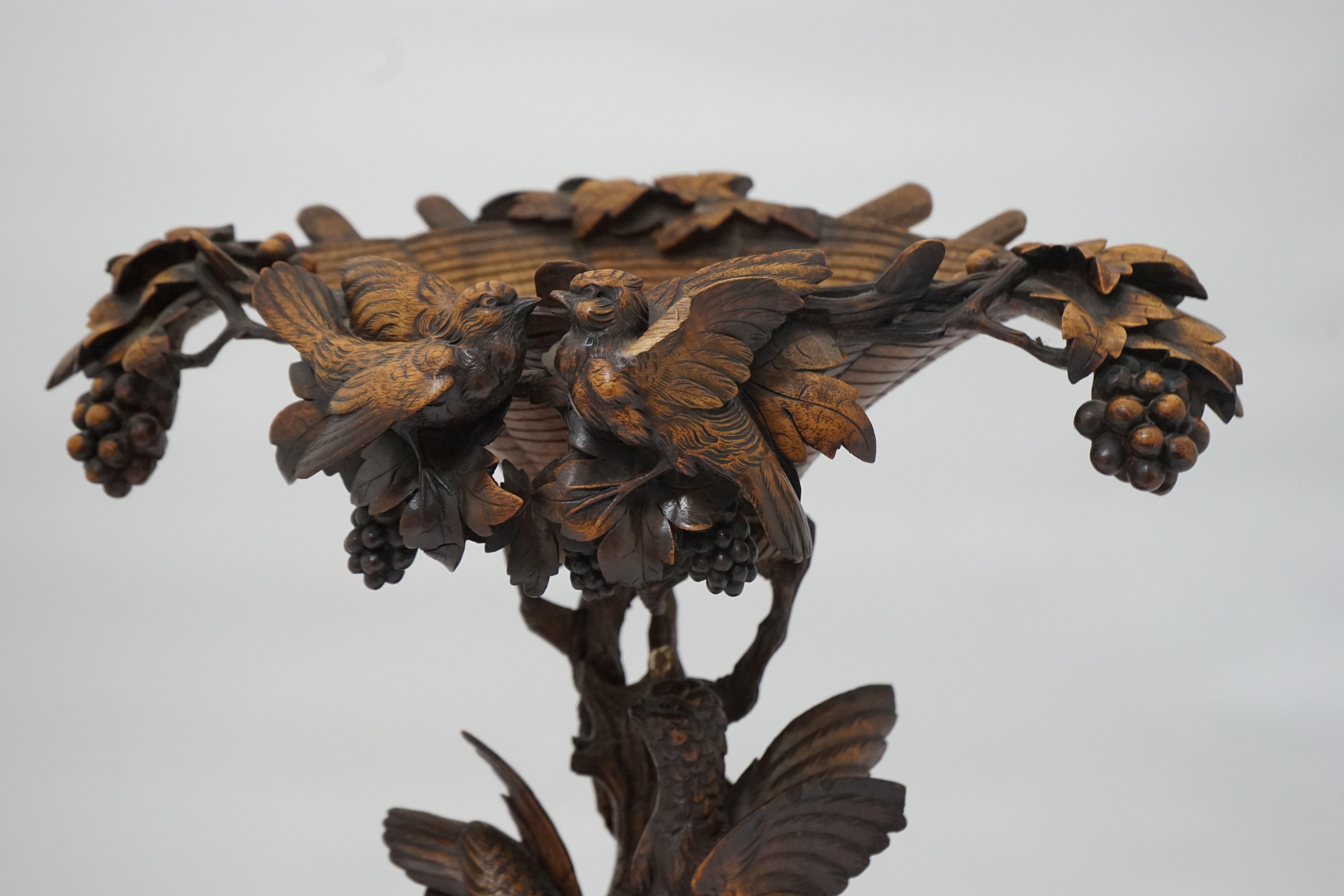 A 19th century Black Forest carved wood centrepiece